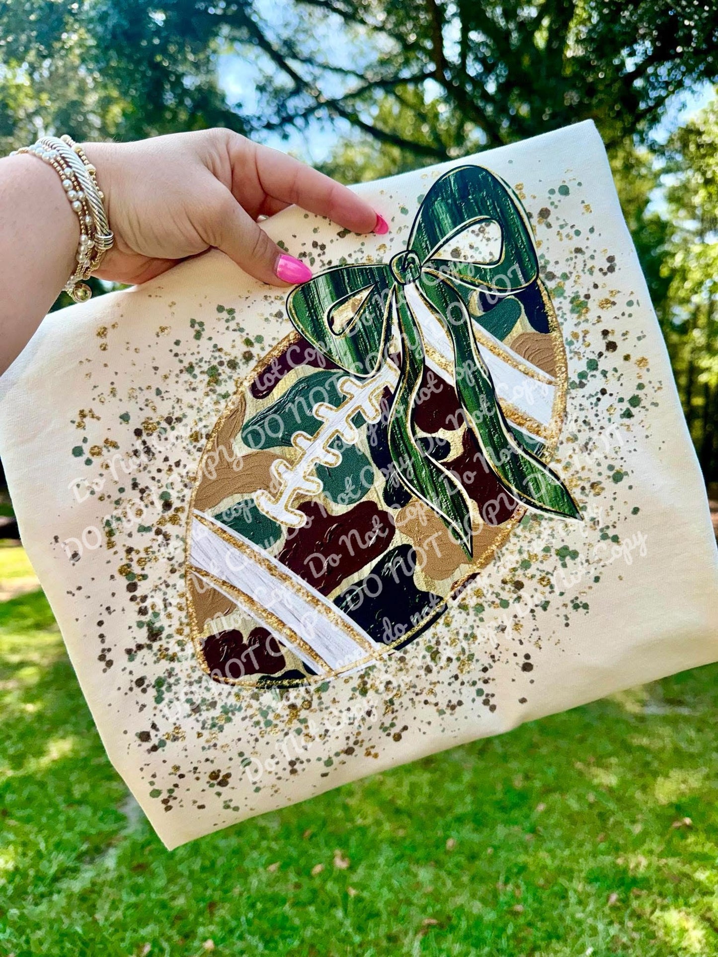 Camo football with bow