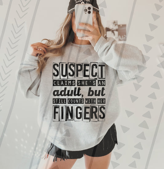 Suspect claims that she’s an adult, but still counts with her fingers