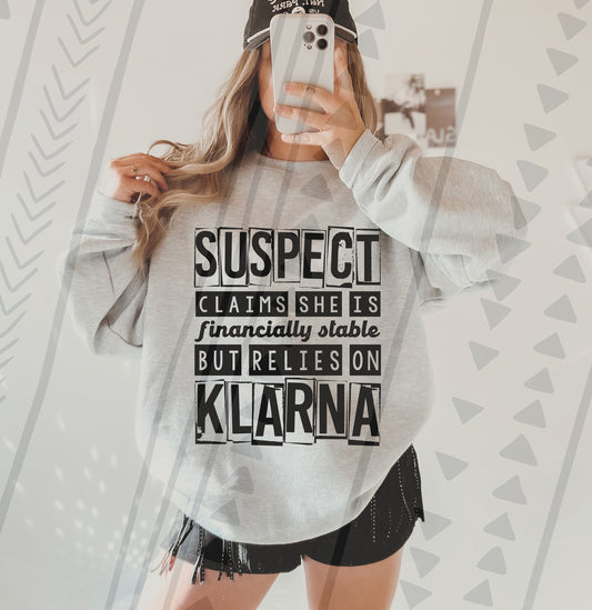 Suspect claims she is financially stable, but relies on Klarna