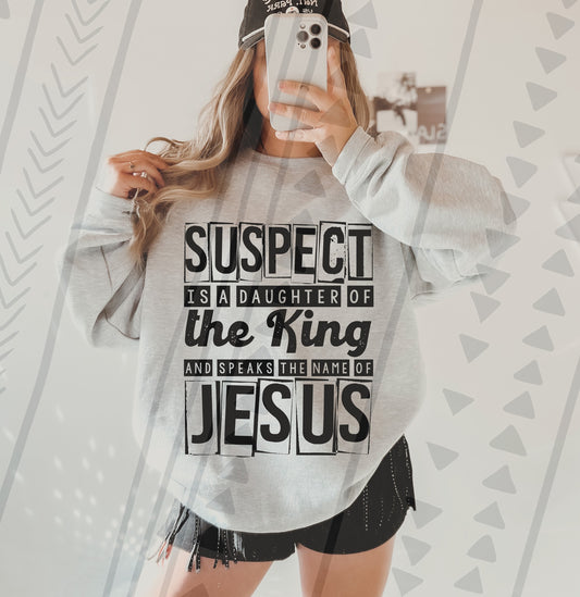 Suspect is a daughter of the king and speaks the name of Christ