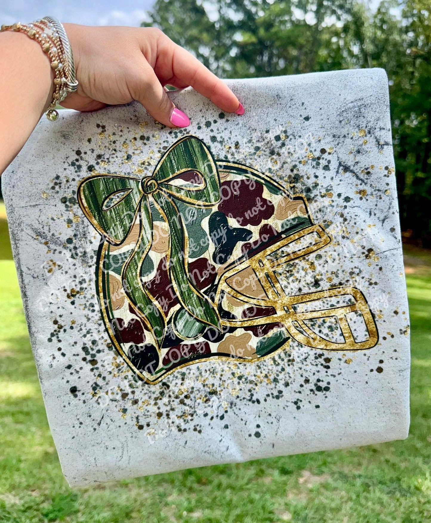 Camo football helmet with bow