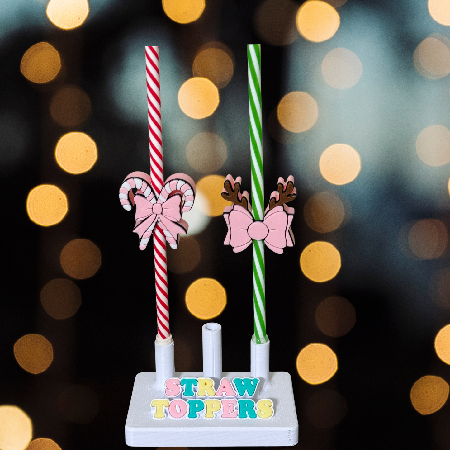 Pink candy canes with pink bow straw topper