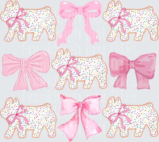 Animal cracker pigs with bows